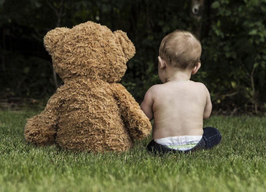 Kid with teddy bear